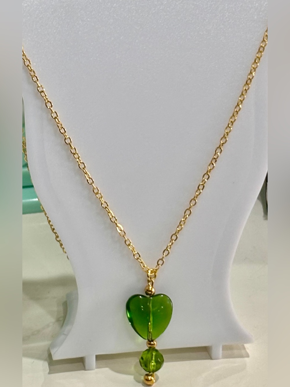 Gold-Tone Necklace with Green Heart Glass Pendant